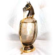 Pokal in Rauchquarz mit Pferdekopf, Verzierungen in Gold und Brillanten 25 cm hoch.